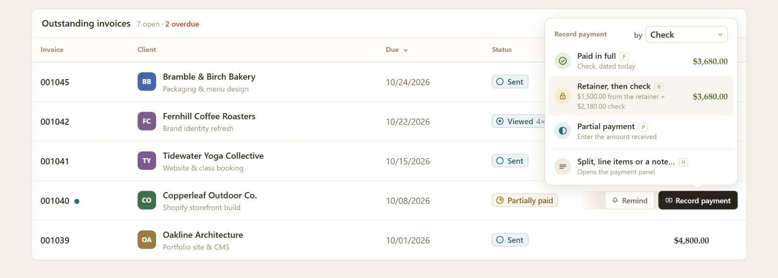 The Record payment menu on an invoice, offering to take part of the amount from the client's retainer and the rest by check